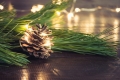 pine-cone-with-garland-branch-wooden-board-christmas-holiday-card.jpg